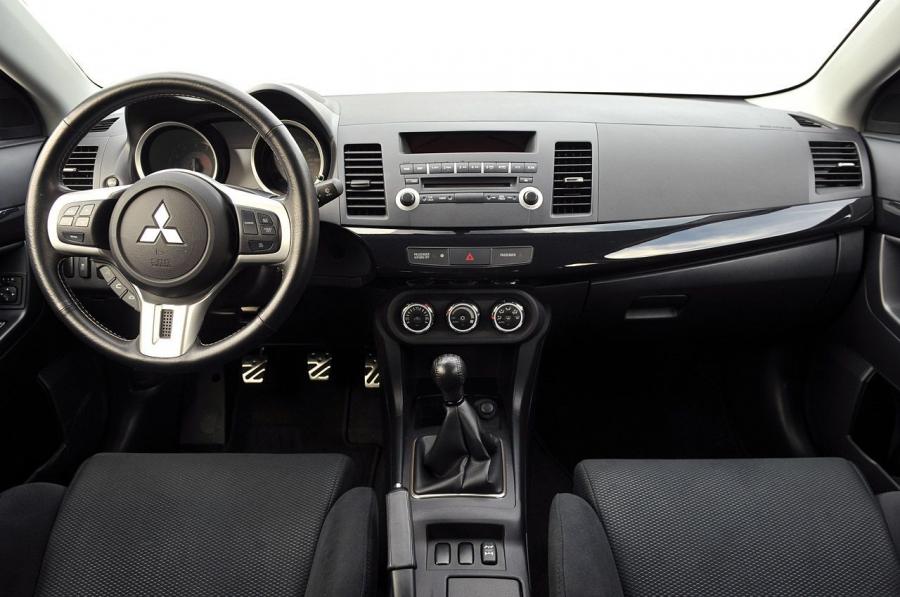  Mitsubishi Lancer Evolution X GSR 2013 года  (фото 26 из 43)